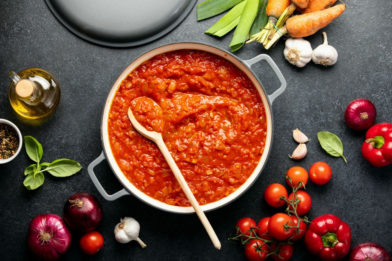 Tomato sauce culinary concept, top down view