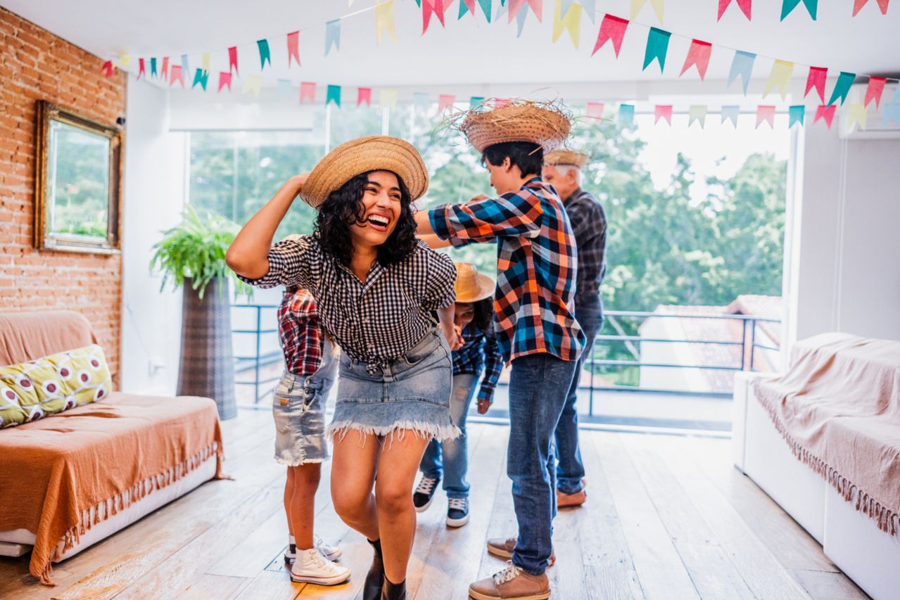 Mid adult woman dancing on a brazilian Junina party